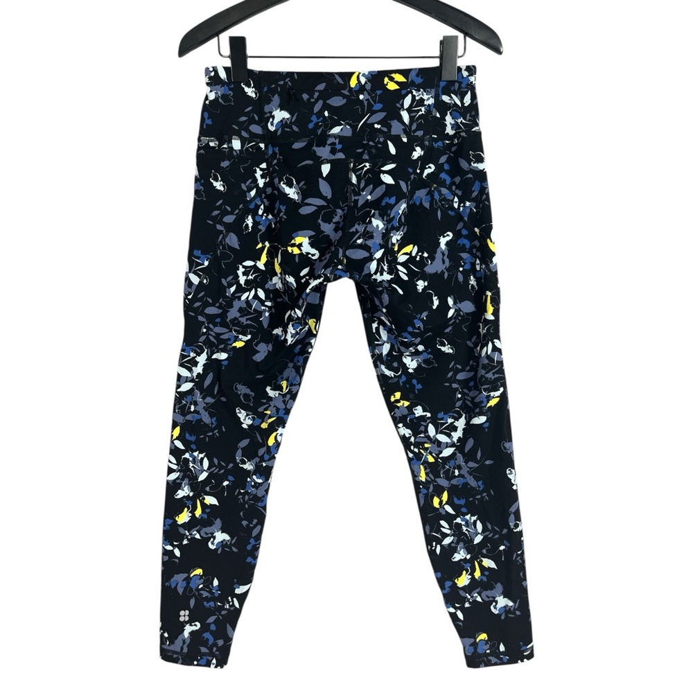 Sweaty Betty Power 7/8 Leggings in a Black Blue Floral Print with Side Pockets - Picture 5 of 6